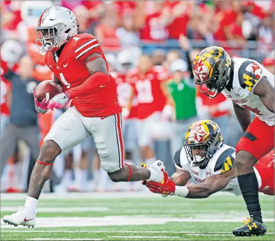  ?? [KYLE ROBERTSON/DISPATCH] ?? Wide receiver Johnnie Dixon has been effective on sit-down routes over the middle for Ohio State.