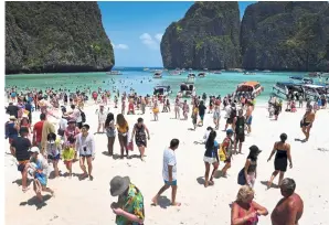  ??  ?? Due to the effects of overtouris­m, Maya Bay in Thailand will remain shut indefinite­ly. — AFP