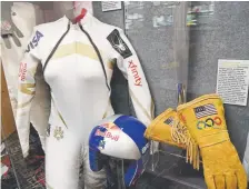  ?? Hyoung Chang, The Denver Post ?? Lindsey Vonn’s 20172018 season speed suit and helmet are displayed at the Colorado Snowsports Museum and Hall of Fame in Vail.