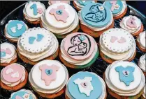  ??  ?? An event celebrated local babies’ first birthdays and the county’s low 2017 black infant mortality rate, well below the statewide rate.