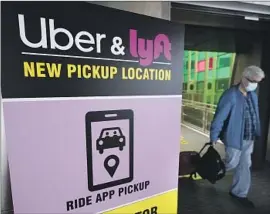  ?? Steven Senne Associated Press ?? LYFT EXPECTS earnings before interest, tax, depreciati­on and amortizati­on of $10 million to $20 million this quarter; Wall Street had projected $81 million.