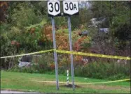  ?? TOM HEFFERNAN SR.—ASSOCIATED PRESS ?? In this Oct. 6, 2018, file photo, a limousine, left, has landed in the woods following a fatal crash in Schoharie, N.Y. The National Transporta­tion Safety Board said on Thursday, Jan. 10, 2019, that some federal employees furloughed under the government shutdown may be recalled to start examining the limousine that crashed in rural upstate New York, killing 20people.