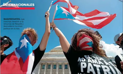  ??  ?? MANIFESTAN­TES. Las marchas llevaron a la renuncia de Roselló y desnudaron la crisis política en la isla.