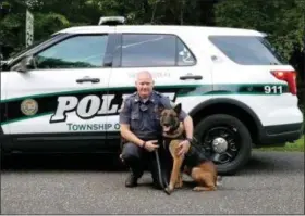  ?? PHOTO FROM LIMERICK POLICE FACEBOOK PAGE ?? Limerick’s newest K-9 officer Rambo with his handler, officer Chris Chris Wienczek.