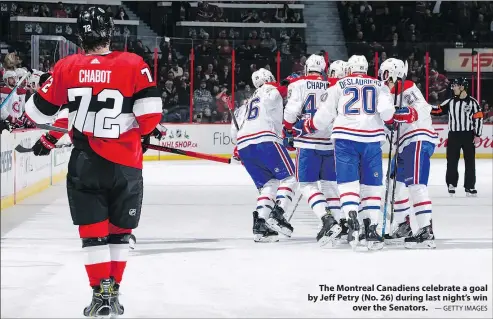  ?? — GETTY IMAGES ?? The Montreal Canadiens celebrate a goal by Jeff Petry (No. 26) during last night’s win over the Senators.