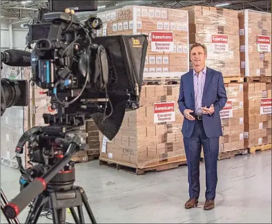  ?? Photo courtesy of Americares / ?? Actor Tony Goldwyn co-hosts the Americares Airlift Benefit Livestream at the Americares distributi­on center in Stamford on Oct. 3.