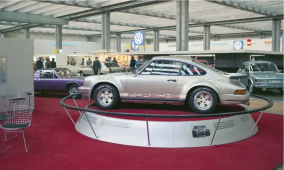  ??  ?? Below: The prototype 930 Turbo shared stand space with a humble Vw-porsche 914 at Frankfurt, representi­ng opposite ends of the Porsche spectrum