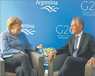  ?? CASA ROSADA ?? G20. Marcri con Angela Merkel, durante la cumbre global en diciembre en Buenos Aires.