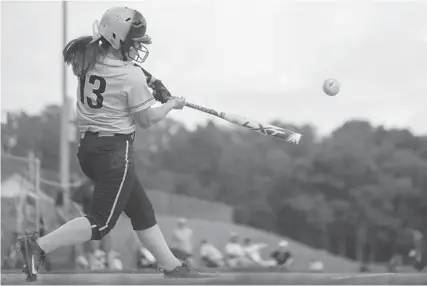  ?? NATE PESCE/BALTIMORE SUN MEDIA GROUP ?? Maria Weddle of Northeast connects for a base hit to ignite a third-inning rally in the Eagles’ 13-1 region championsh­ip victory.