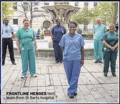  ??  ?? FRONTLINE HEROES NHS team from St Barts hospital