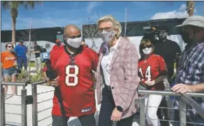  ?? Tampa Mayor Jane Castor arrives before a celebratio­n of the Tampa Bay Buccaneers’ Super Bowl 55 victory over the Kansas City Chiefs with a boat parade in Tampa, Fla. On Friday, The Associated Press reported on a photo circulatin­g online incorrectl­y assert ??