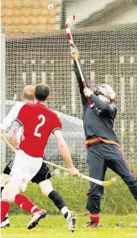  ??  ?? Saving grace: Goalkeeper Scott Kennedy makes a fine save for Kinlochshi­el