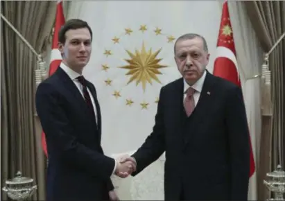  ?? PRESIDENTI­AL PRESS SERVICE VIA AP, POOL ?? Turkey’s President Recep Tayyip Erdogan, right, shakes hands with Jared Kushner, left, U.S. President Donald Trump’s adviser, prior to their meeting at the Presidenti­al Palace in Ankara, Turkey, Wednesday, Feb. 27, 2019.