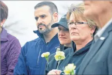  ?? TINA COMEAU ?? At the end of the Day of Mourning ceremony flowers were laid in tribute to those who have lost their lives or been injured on the job.