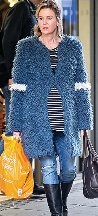  ?? Picture research: CLAIRE CISOTTI ?? SAINSBURY’S BAG, MULBERRY HANDBAG AND SHRIMPS COAT Have just done my Sainsbury’s shop, like an ordinary person. Look how normal self can be! Am also carrying a Mulberry Bayswater handbag (£ 950) and wearing fluffy coat (£498) from trendy Shrimps shop. How on earth can I afford all this expensive stuff?