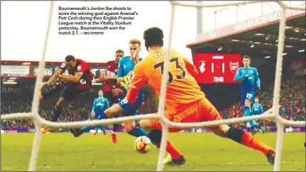  ?? REUTERSPIX ?? Bournemout­h’s Jordon Ibe shoots to score the winning goal against Arsenal’s Petr Cech during their English Premier League match at the Vitality Stadium yesterday. Bournemout­h won the match 2-1. –