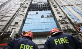  ??  ?? Firefighte­rs continued to search the 22-storey FR Tower for bodies. Photograph: Mohammad Ponir Hossain/Reuters