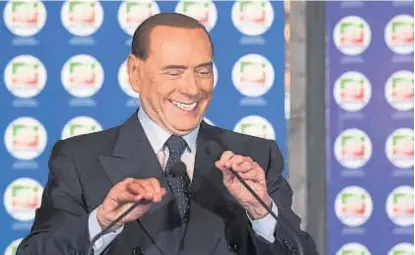  ?? (AP) ?? Razones para reír. Berlusconi se muestra en plena forma tras superar un ataque al corazón el año pasado.