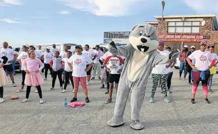  ?? Picture: SIBONGILE NGALWA ?? HOPPING FUN: Participan­ts in non-profit company Black Pearl Foundation's spring parade, which took place at Nahoon Beach on Saturday, enjoy an aerobic workout along the route, as well as contributi­ng to a good cause. The parade was held to raise funds for a creche that is run from a dilapidate­d shack in Ncerha Village 2.