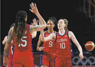  ?? Eric Gay / Associated Press ?? Breanna Stewart (10) celebrates a score against Australia with her American teammates.