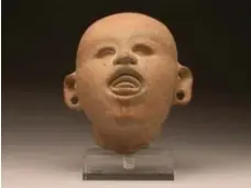  ?? THE GARDINER MUSEUM ?? Head of Xipe Totec, a Mesoameric­an god with a taste for sacrificia­l blood.