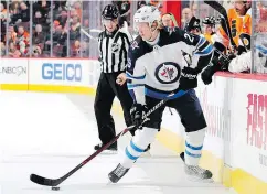  ?? — GETTY IMAGES ?? Jets star Patrik Laine is prone to giving up control of the puck lately and has never looked less confident as an NHL player, writes Ted Wyman.