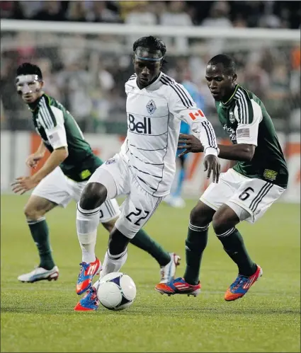  ?? — GETTY IMAGES ?? Whitecaps star Darren Mattocks dribbles during 2-1 loss to Portland Saturday night.