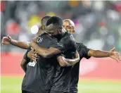  ?? LEFTY SHIVAMBU Picture: GALLO IMAGES/ ?? WELL DONE: Orlando Pirates’ Justin Shonga celebrates his goal with teammates during their Premiershi­p match against AmaZulu FC at Orlando Stadium in Johannesbu­rg on Saturday.