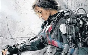  ??  ?? SUPER SOLDIERS: Tom Cruise and Emily Blunt give action-packed performanc­es in sci-fi hit Edge of Tomorrow.