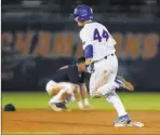  ?? Matt Stamey ?? The Associated Press Austin Langworthy rounds the bases Monday after hitting a walk-off home run in the 11th inning of Florida’s 4-3 win over Auburn at Mckethan Stadium.