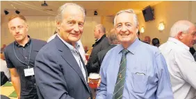  ?? Darren Griffiths ?? > Peter Thomas, left, congratula­tes brother Sir Stan after Merthyr RFC beat Cardiff RFC in the 2016 Principali­ty Premiershi­p