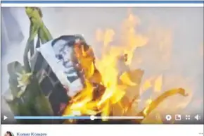  ?? FACEBOOK ?? Cambodian-Australian protesters burn an effigy bearing Prime Minister Hun Sen’s face on a beach yesterday, a day after he warned protesters he would follow them home and beat them if they did so on an upcoming trip.