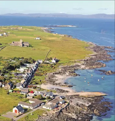  ?? Photograph: Iain Thornber. ?? The village of Iona and its world famous abbey.