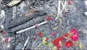  ?? HT FILE ?? Flowers kept at the site of Kamala Mills fire as a mark of respect to the victims of the blaze.