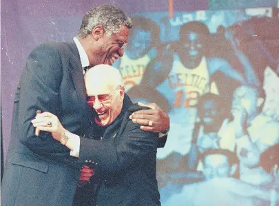  ?? FILE PHOTO ?? HAND IN HAND: Bill Russell, left, and Red Auerbach co-authored a run of Celtics history that has yet to be equaled.