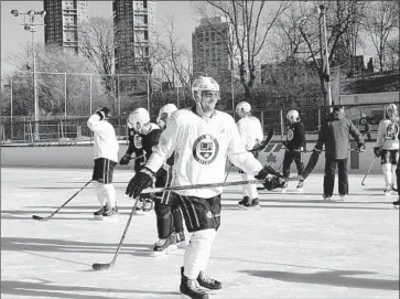  ?? Emily Griganavic­ius Los Angeles Kings ?? KINGS CAPTAIN Anze Kopitar takes part in a practice at Lasker Rink in Central Park. The sun was out but the temperatur­e was 34 degrees and the wind was blowing.