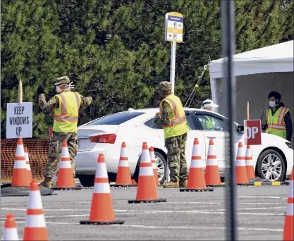  ?? Will Waldron / Times Union ?? New York National Guard members will be among the first members of the military to receive doses of the Pfizer-biontech vaccine if it is approved by the FDA.