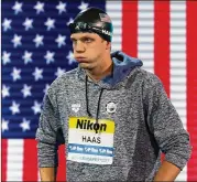  ?? AL BELLO / GETTY IMAGES ?? Texas’ Townley Haas won three relay gold medals as part of the U.S. team at the World Championsh­ips in Hungary.