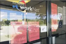  ?? (AP PHOTO/NAM Y. HUH) ?? In this June 11, 2020 file photo, informatio­n signs are displayed at the closed Illinois Department of Employment Security WorkNet center in Arlington Heights, Ill. U.S. businesses sharply reduced hiring July 2020, in a sign that the resurgent viral outbreak this summer slowed the economic recovery as many states closed parts of their economies again and consumers remained cautious about spending.