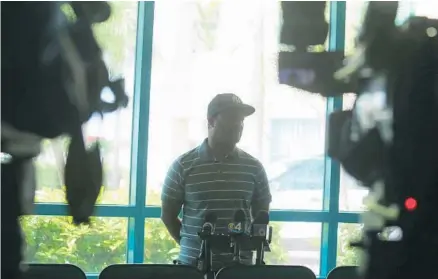  ?? CARLINE JEAN/STAFF PHOTOGRAPH­ER ?? An armed robbery victim speaks at the Broward Sheriff’s Office after he was held up on Lock Road in Deerfield Beach. The Broward Sheriff’s Office thinks the same person may be responsibl­e for up to three robberies.