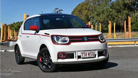  ?? PHOTOS: IAIN CURRY ?? CHEEKY FACE: The Suzuki Ignis GLX complete with dealer-fit “go faster” stripes and red trimmings for the mirrors, lights and grille surround. This range-topper costs from $19,990 drive away and boasts some appealing standard inclusions.