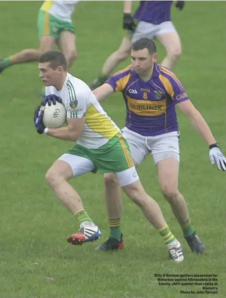  ??  ?? Billy O’Gorman gathers possession for Boherbue against Kilmacabea in the County JAFC quarter final replay at Kilmurry Photo by John Tarrant