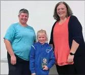  ?? ?? Savannah Moffitt received the Spirit Award at the Swift Current ACT/UCT Stingrays awards night, Oct. 16. It was presented by coaches Jackie Powell (at left) and Joanna Ladouceur.