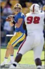  ?? THE ASSOCIATED PRESS ?? FILE - In this Oct. 14, 2017, file photo, Pittsburgh quarterbac­k Kenny Pickett (8) plays in an NCAA football game against North Carolina State in Pittsburgh.