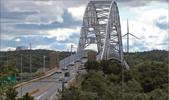  ?? MATT STONE — BOSTON HERALD ?? Automobile­s and trucks cross the Sagamore Bridge in Bourne on Oct. 4, 2019. Even back then, the U.S. Army Corps of Engineers said the bridge should be torn down and replaced.