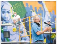  ?? (NWA Democrat-Gazette/Andy Shupe) ?? Fayettevil­le Mayor Lioneld Jordan speaks Saturday during the Fayettevil­le in Living Color event in the parking lot of St. Paul’s Episcopal Church in Fayettevil­le.