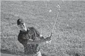  ?? DARRON CUMMINGS/AP ?? Tiger Woods hits out of a bunker on the 15th hole during a practice round for the Memorial on Tuesday in Dublin, Ohio.