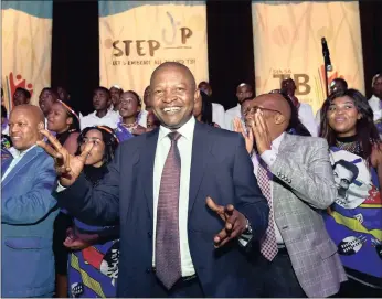  ?? PICTURE: ELMOND JIYANE/GCIS ?? Deputy President David Mabuza with Health Minister Aaron Motsoaledi on his left, dances with the choir at the official opening of the 5th South African TB Conference yesterday at the Inkosi Albert Luthuli Internatio­nal Convention Centre in Durban.