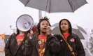  ?? Photograph: Courtesy of Union of Southern Service Workers/Union of Southern Service Workers ?? TyBrianna Shaw, a Dollar General worker on strike, speaks through a megaphone.