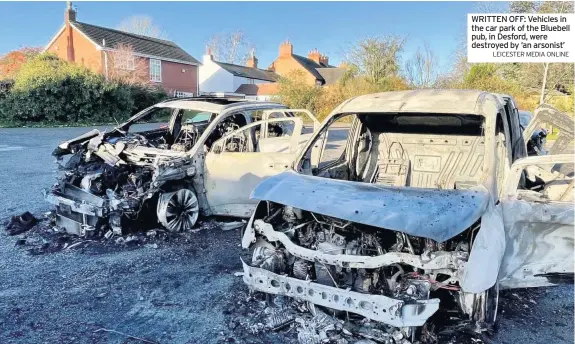  ?? LEICESTER MEDIA ONLINE ?? WRITTEN OFF: Vehicles in the car park of the Bluebell pub, in Desford, were destroyed by ‘an arsonist’